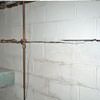 Severe foundation damage from a long crack in a bucking wall of a Grayson home.