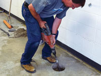 Coring the concrete of a concrete slab floor in Jackson
