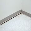 A partition wall separating from the floor in a Elkview home.
