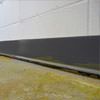 a sinking floor leaving a large gap between the wall and floor in a Oak Hill home