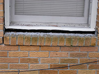 A window sill cracking and separating from the foundation wall in a Wheelersburg home.
