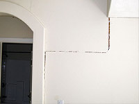 Drywall cracking due to foundation settlement in Oak Hill