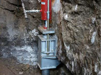 Foundation repair contractors lifting a structure in Charleston.