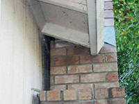 A chimney leaning away from the home on a Louisa foundation