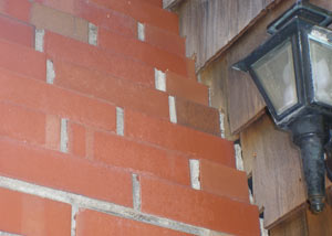 a repaired chimney in South Point that had shown serious foundation damage and was repaired with a helical pier system.