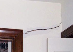 A large drywall crack in an interior wall in Portsmouth