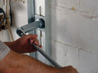 Mounting a foundation wall channel anchor in Marietta.