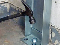 Mounting a foundation channel anchor installation to the floor in Marietta.