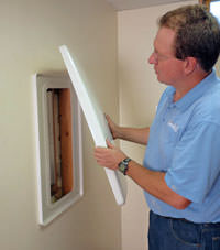 wall anchor covers installed in a foundation repair for a Elkview home.