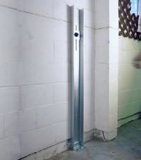 A failing foundation wall repaired with a foundation wall channel anchor system in a Athens home.