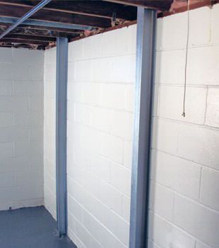 A PowerBrace™ i-beam foundation wall repair system in Saint Albans