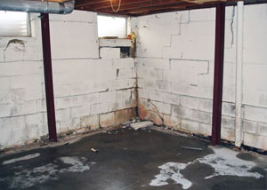 A failed, rusty i-beam foundation wall system installed in Catlettsburg.