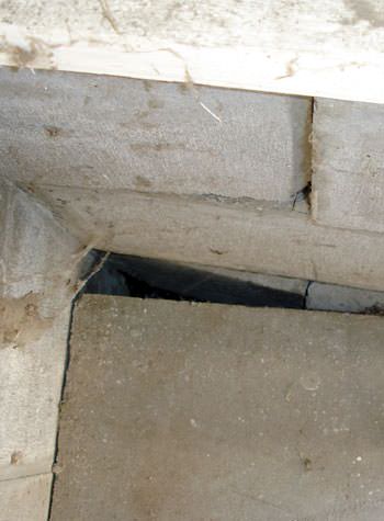 inward rotation of a foundation wall damaged by street creep in a garage in Greenup