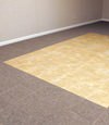 tiled and carpeted basement flooring installed in a Beckley home